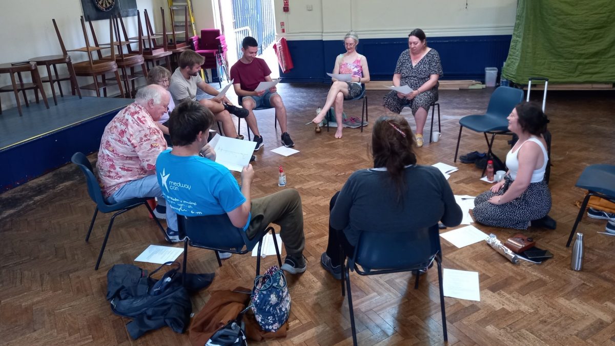 Artist Sophie Stone leading a You Me Us Too workshop on Experimental Music at Arches Local's Singing Group at Invicta Social Club, Chatham (July 2022, Photo K.Cross)